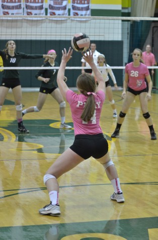 Kennedy volleyball plays Iowa City West in Dig Pink event