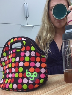 A student at SMART lunch enjoys her meal.