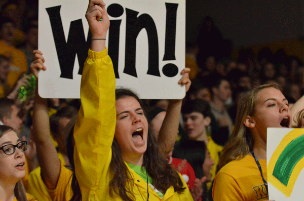 Junior Kourtney Holzer loudly cheers on her class as they take on the seniors for the coveted spirit stick. 