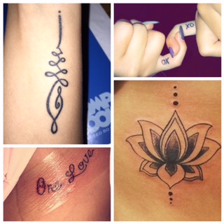 Alex Strait Sr. displaying her four tattoos 