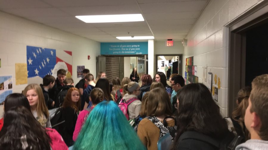 Students pass through the social studies hallway at Kennedy during the cruise and stop at classes to explore class options for next year.