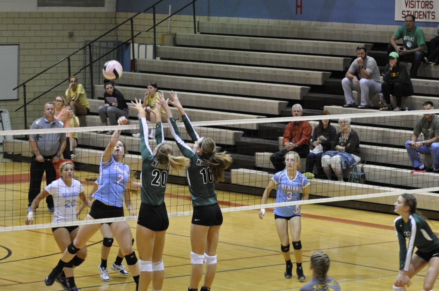 #20 Mikayla Winter sr., and #18 Elyse Winter fr., go up to block. 