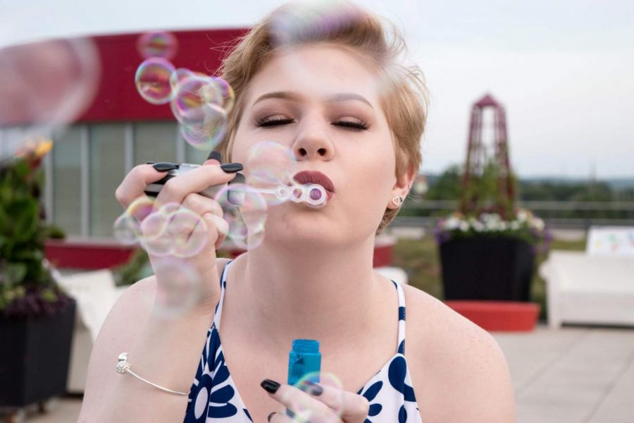 Ellis favorite photo Wonase took of her senior photos. She loves it so much because of the bubbles and her make up and how its all captured. 