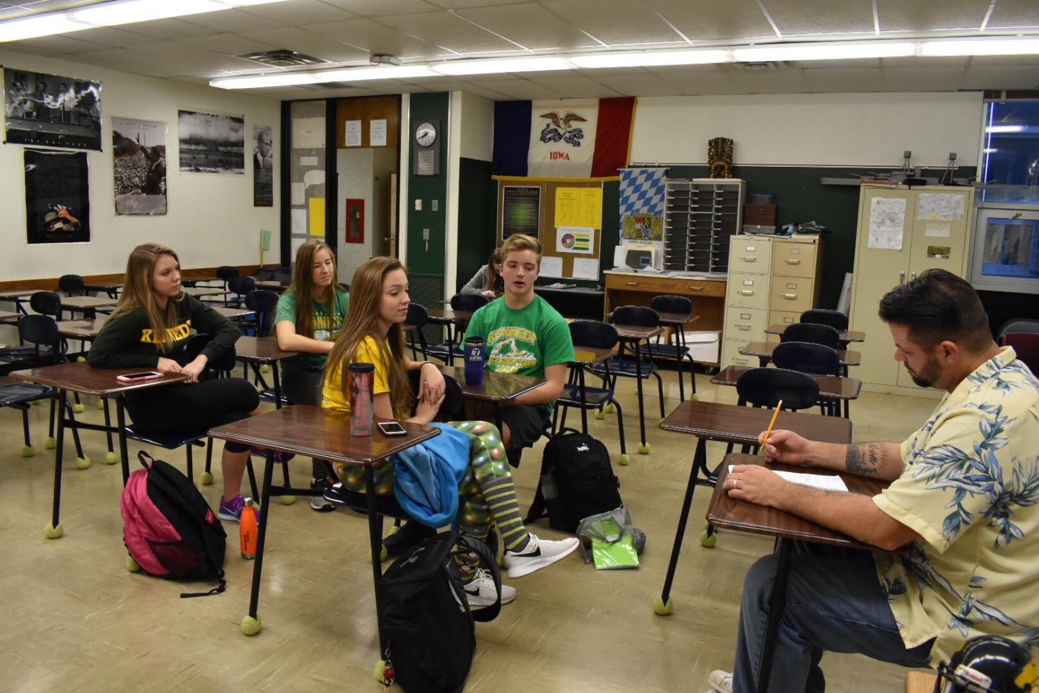 The Green Team members and one of the advisors, Mr. Anderson during one of their meetings.