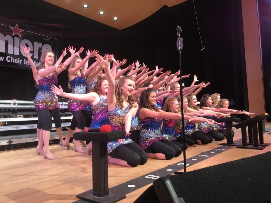 The group in their end pose after their performance.