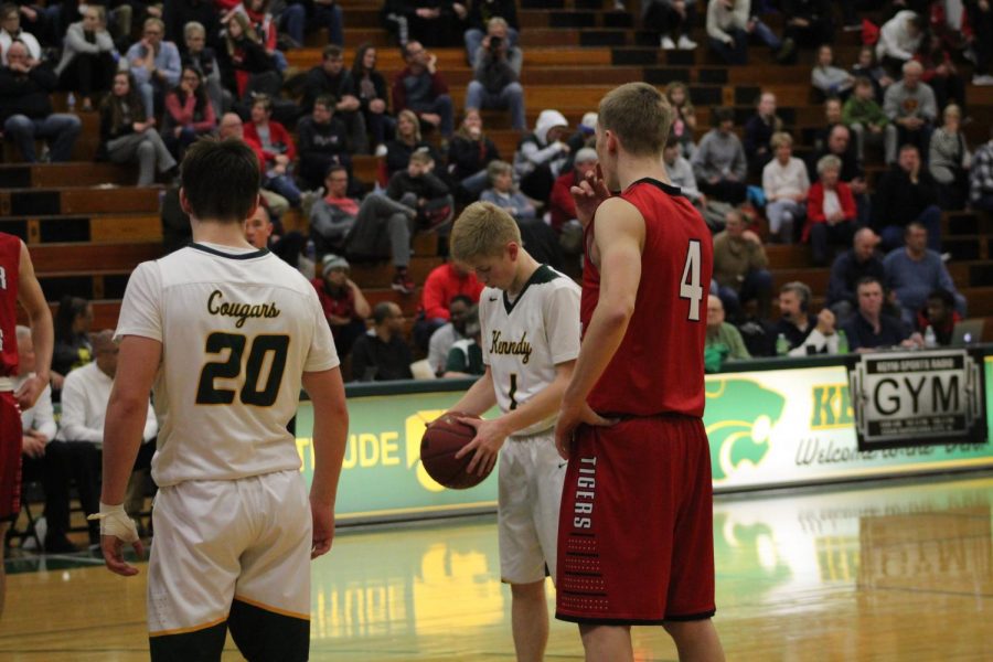 Jackson Foley, sr., at the line to shoot a free throw. 
