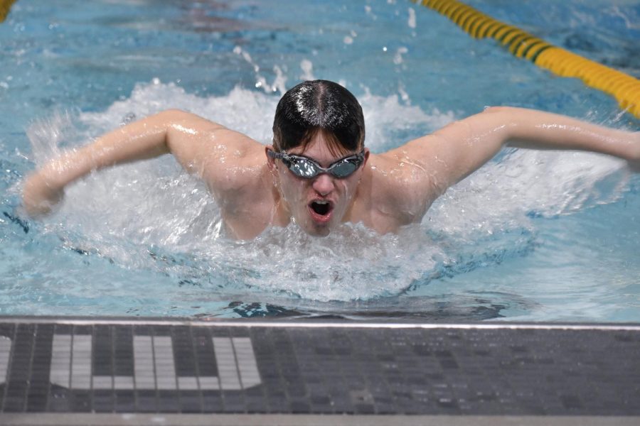 Danny Mulhern fr., swims in the individual medley. 