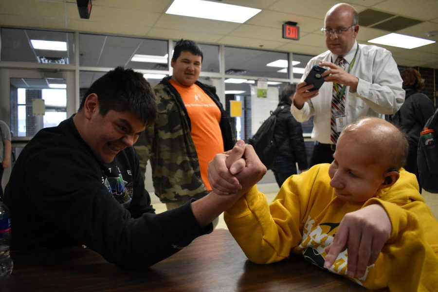 Senior Angel Franco arm wrestling junior Jack Hoeger during SMART Time on April 4.