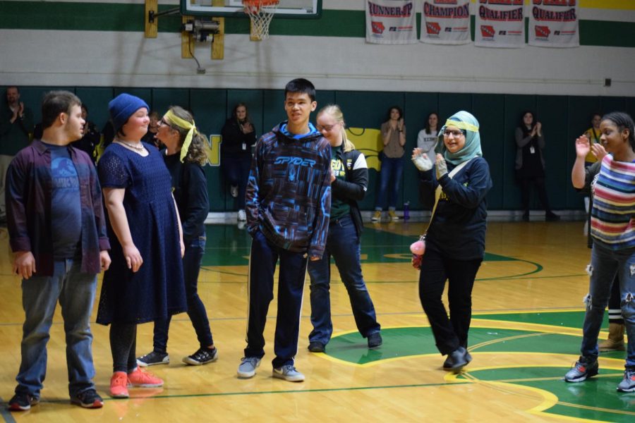 Special Olympic athletes are recognized for their sports during the pep assembly.