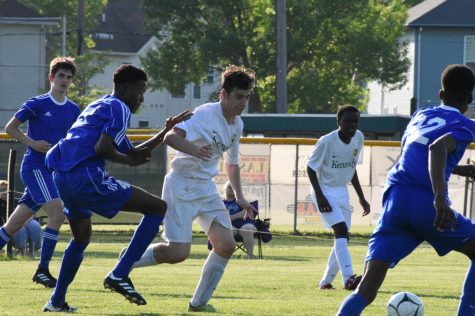 Conrado Chozas-Martinez racing towards the ball, against Washington Warriors. The JV 2 soccer game was on May 16, losing 3-2.