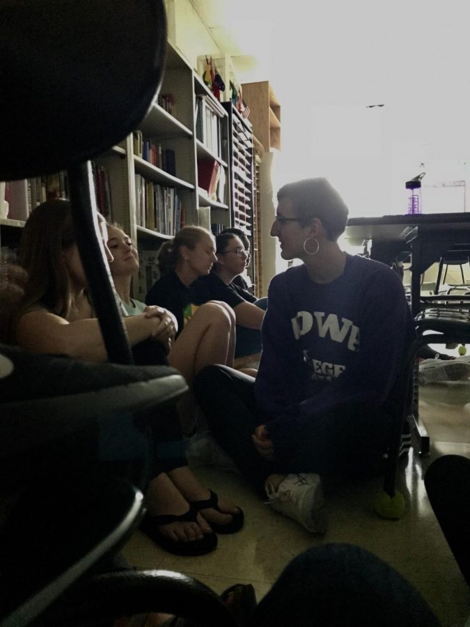 Kennedy students in Mr. Evans sixth period AP United States Government class huddle in the corner of his room during the Hide lock down drill that occurred on Aug. 28.