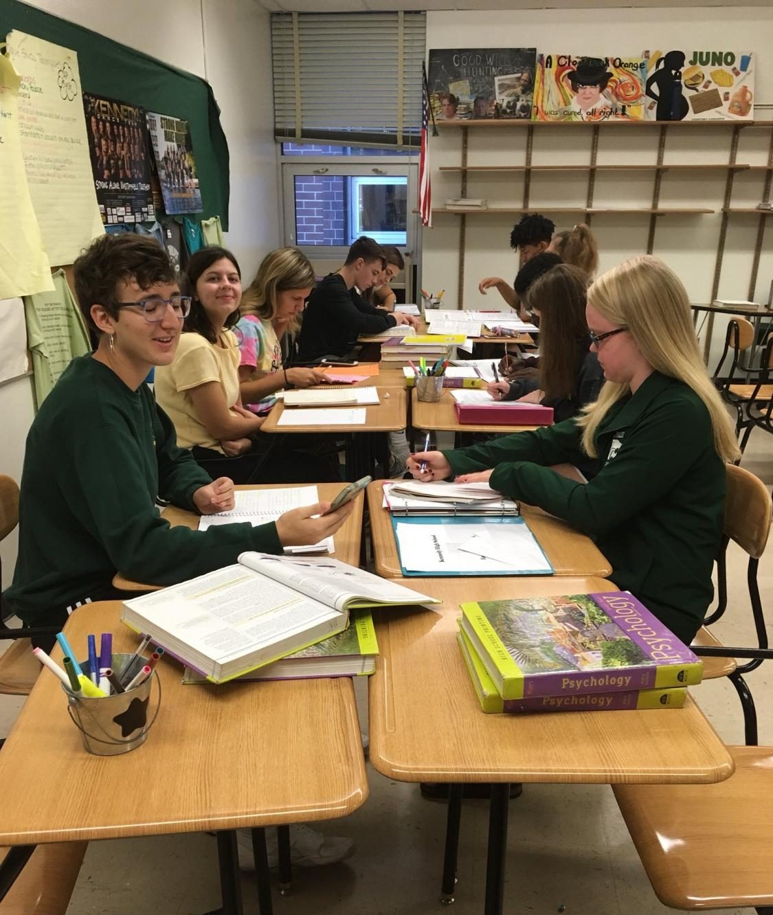 (Left) Seniors Emma Teggatz and Lily Gust helping out underclassmen during SMART Time in Dana Melone's room.
