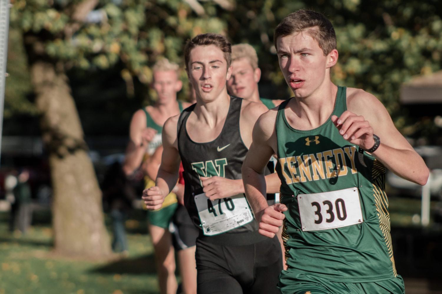 Junior Jacob Green runs at the Eastern Iowa Classic cross country meet where he finished in 16:54.98