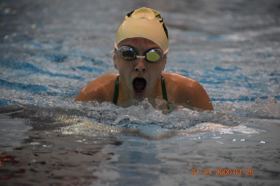 Freshman Leah Bakewell, swimming breast stroke.