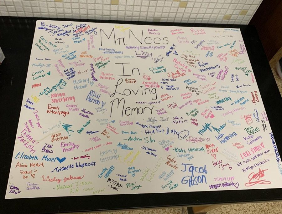 Students signed this poster in the hallways to write their memories or condolences.