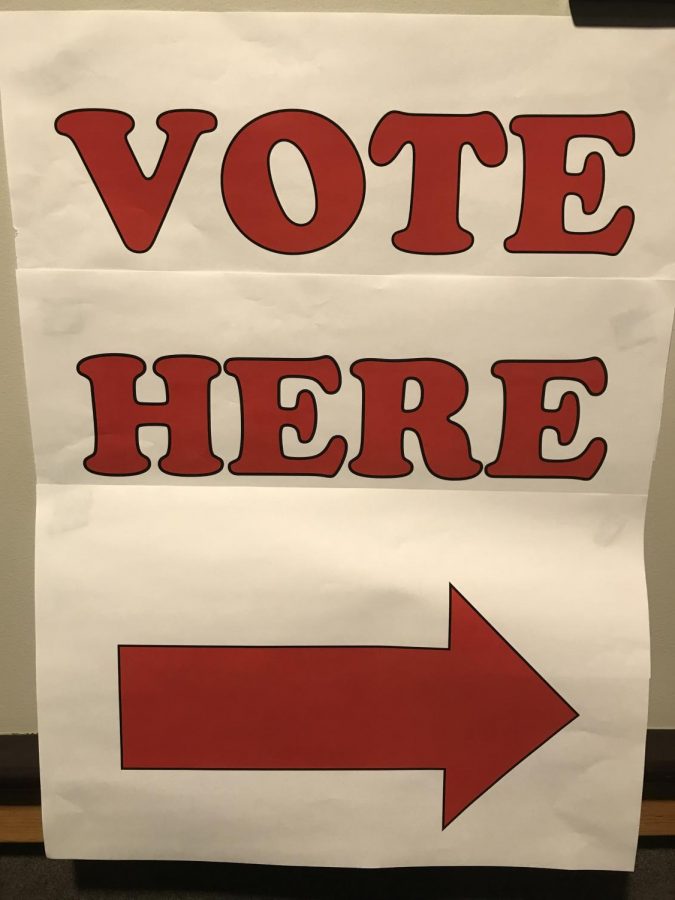 A poster outside a polling station on Nov. 6. This poster alerted voters approaching the polling place. On Nov. 6, midterm elections took place.