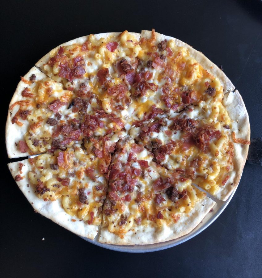 Mac and Cheese pizza with bacon and ground beef.