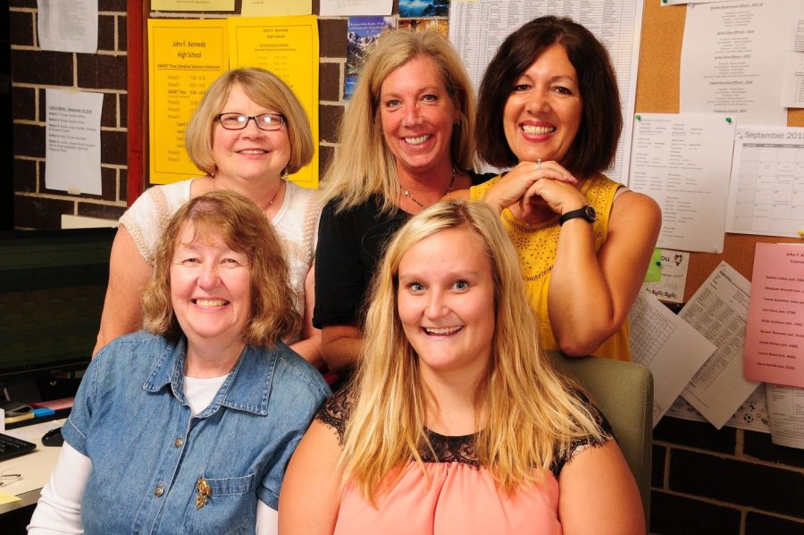 Laurie Wery, pictured top right, with her beloved colleagues with who she has developed strong friendships with throughout her time at Kennedy. 

