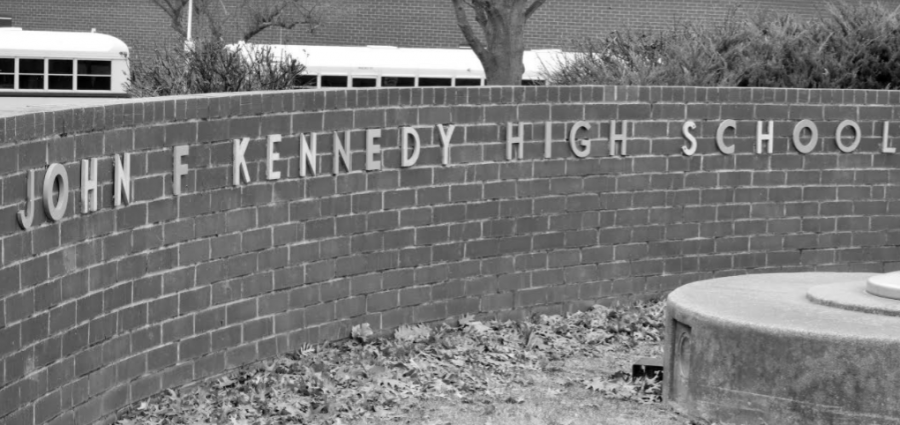 The Kennedy High School sign located in front of the building.