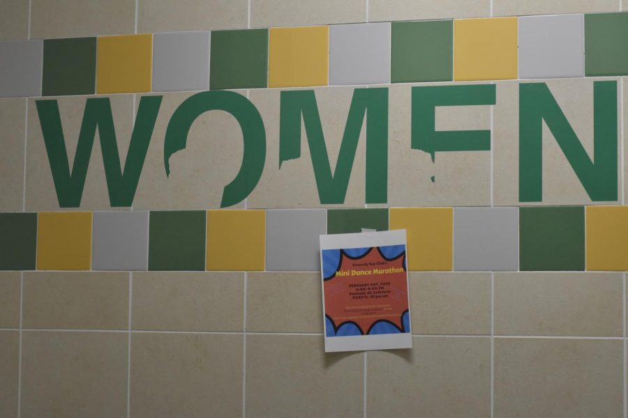 The womens bathroom stall near the gym, prior to being painted.