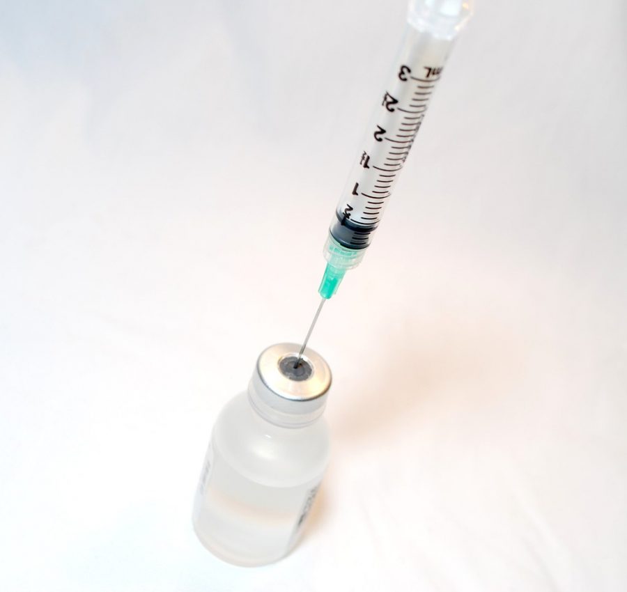 Syringe and Vaccine by NIAID is licensed under CC BY 2.0