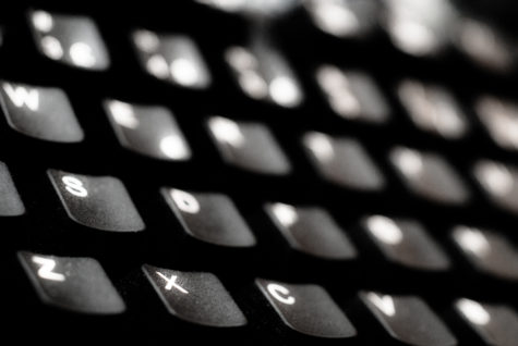 Students stare at a keyboard and computer screen all day for school.