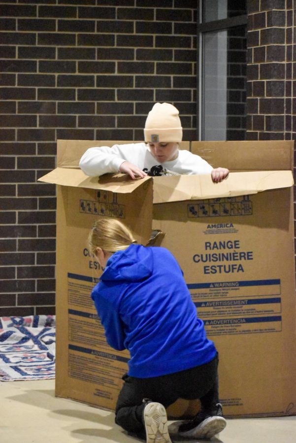 Participating student spent the night in cardboard boxes outside.