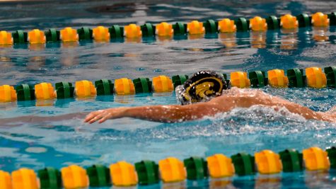 A.J. Miller (FR) swims the first leg of the 200 Yard Free Relay, giving the relay a head start leading to them taking first place.