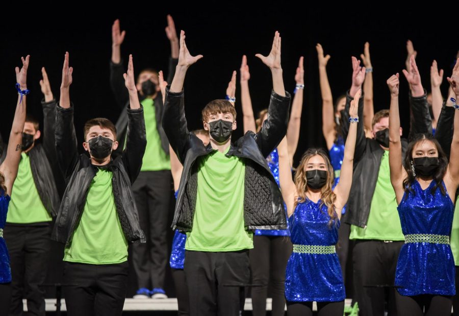 Happiness Inc.s show choir performance from 2021, with everyone wearing a mask.