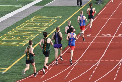 Photos: Boys Track Competes in Invitational at Kingston