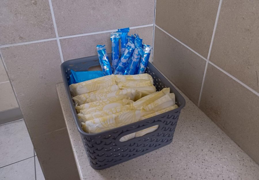 Sanitary product basket in womens bathroom at Kennedy 