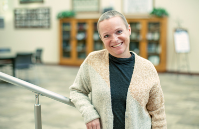 Noreen Bush poses for a photo after discussing her chemo treatments.