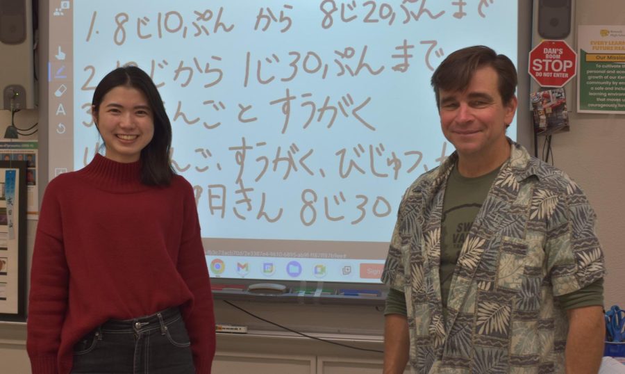 Shiho Yabuchi and Daniel Carolin pose for a photo in their classroom. 