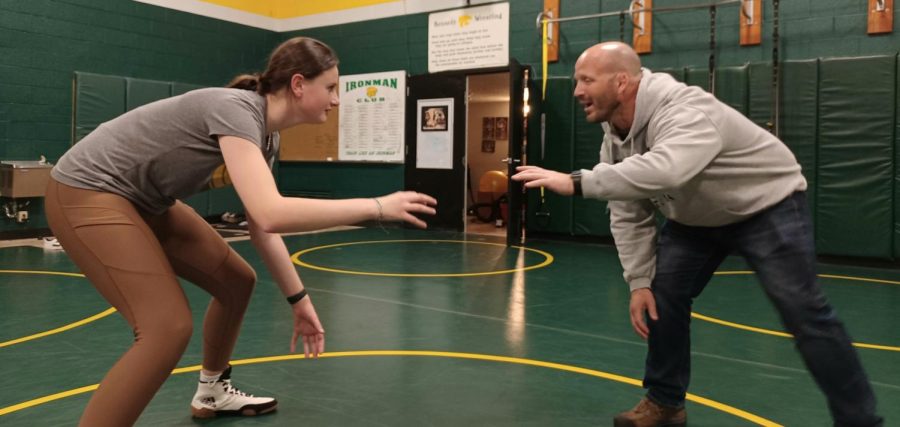 Josie Bunce practicing her moves with Craig Mallicoat at the open mats.