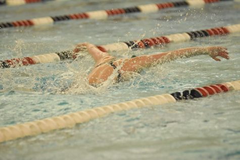 Junior Maria Trotta swimming the butterfly leg of the 200 Yard Medley Relay at regionals.