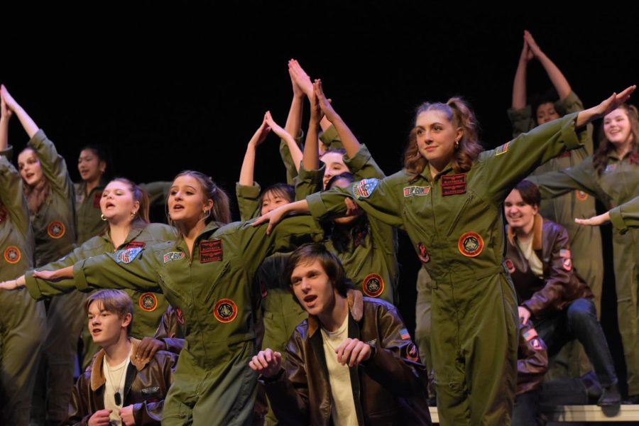 Protégé, Kennedys Junior Varsity Show Choir, performs Mighty Wings as their opener for their Top Gun-themed show.