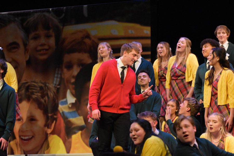 Jake Horton, portraying Mr. Rogers, sings Its You I Like during the ballad.