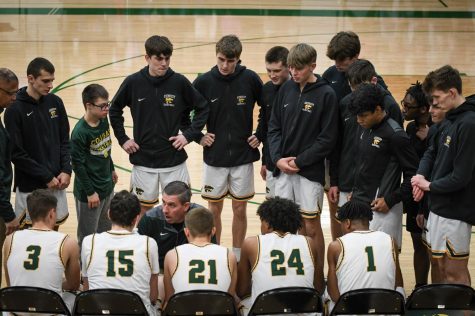 Coach Mckowen delivering a pre-game speech
