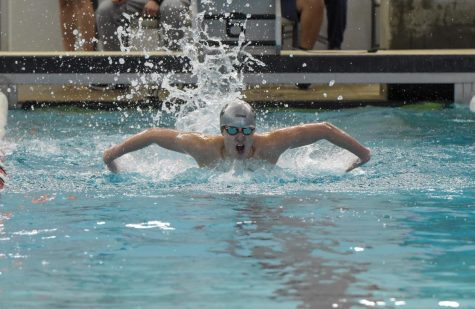 Drake Kline approaches the end of a fast 100 Yard Butterfly.