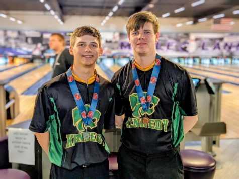 Seniors Jaxon Robinson and Lucas Dolphin pose with their medals after achieving second and third at the state bowling competition.