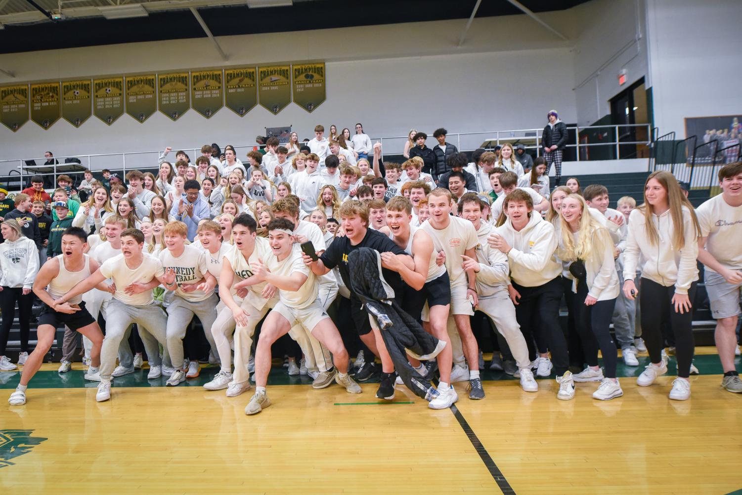 The Kennedy Student Section waits in anticipation for the team before they rush the court.