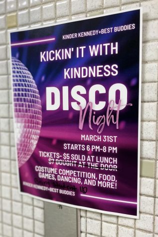 Posters promoting the event hang through the school.