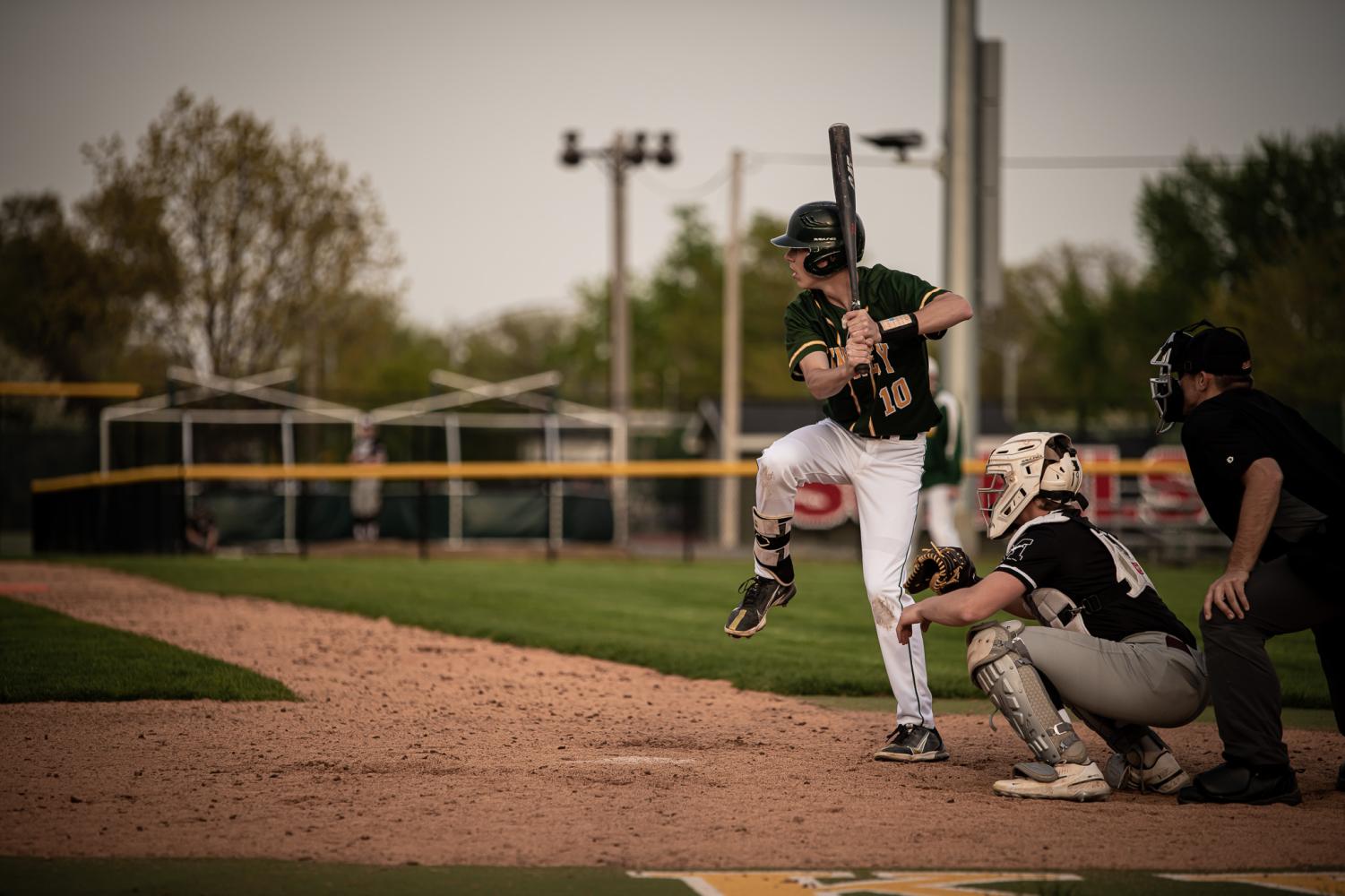 Senior Nolan Grawe winds up to swing at home plate.