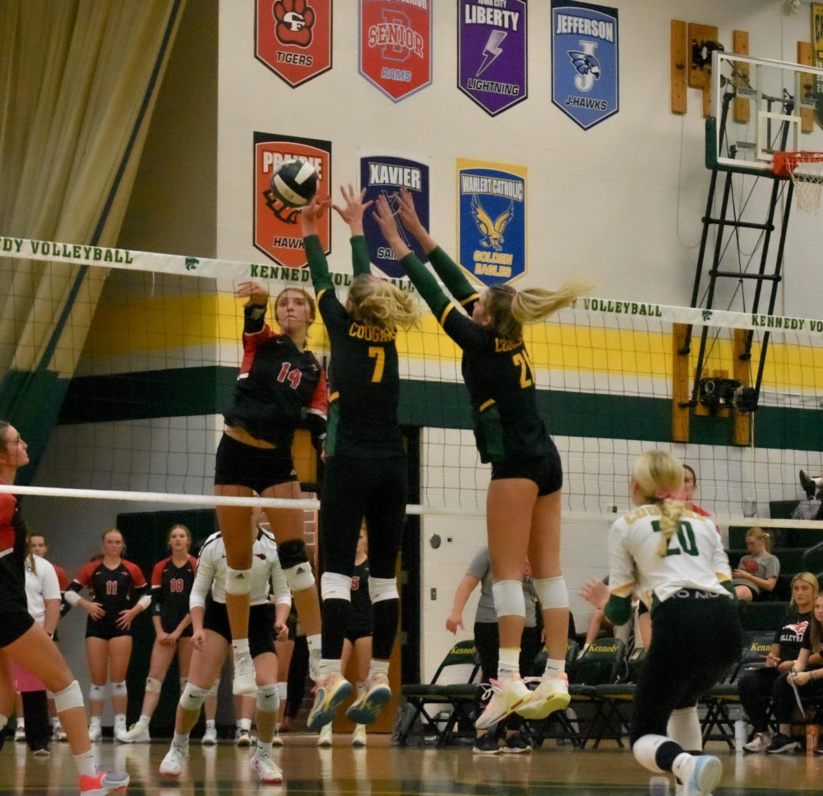 Juniors Ady Hermanson and Jenna Younge go up for a block.