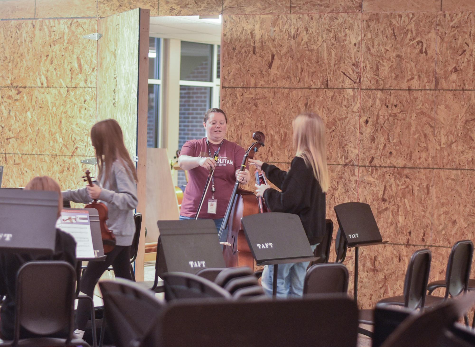 Orchestra classes being held in the foyer.