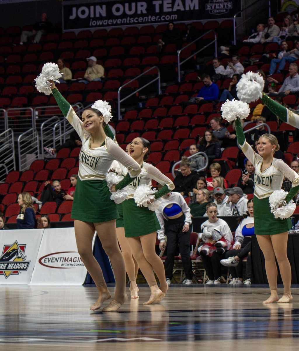 The Kennedy Dance Team exits the floor after performing their Poms routine.