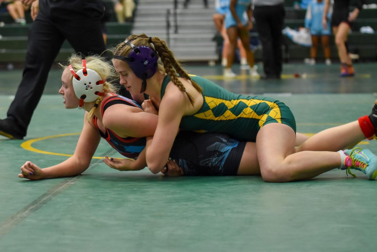 Grace Hallam stops her opponent from getting away.