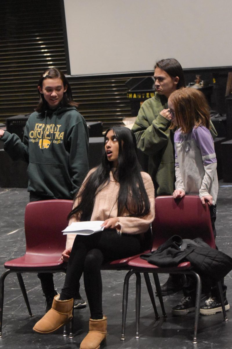 Kennedy Speech rehearses in the black box for their upcoming performances.