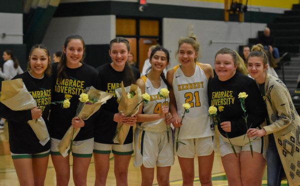 Senior girls pose for a picture after the senior night walk.