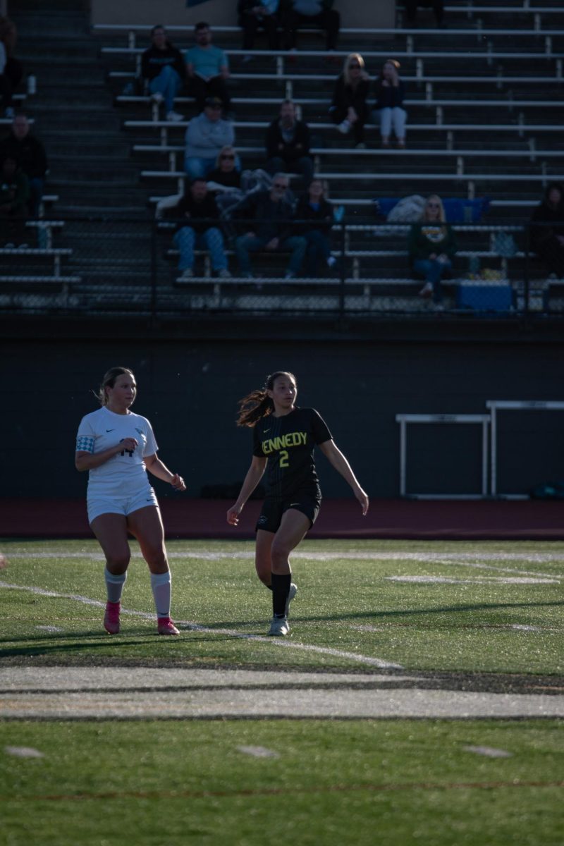 As the ball is being kicked down the field, sophomore #2 Morgan Hospodarsky follows the ball with her eyes.